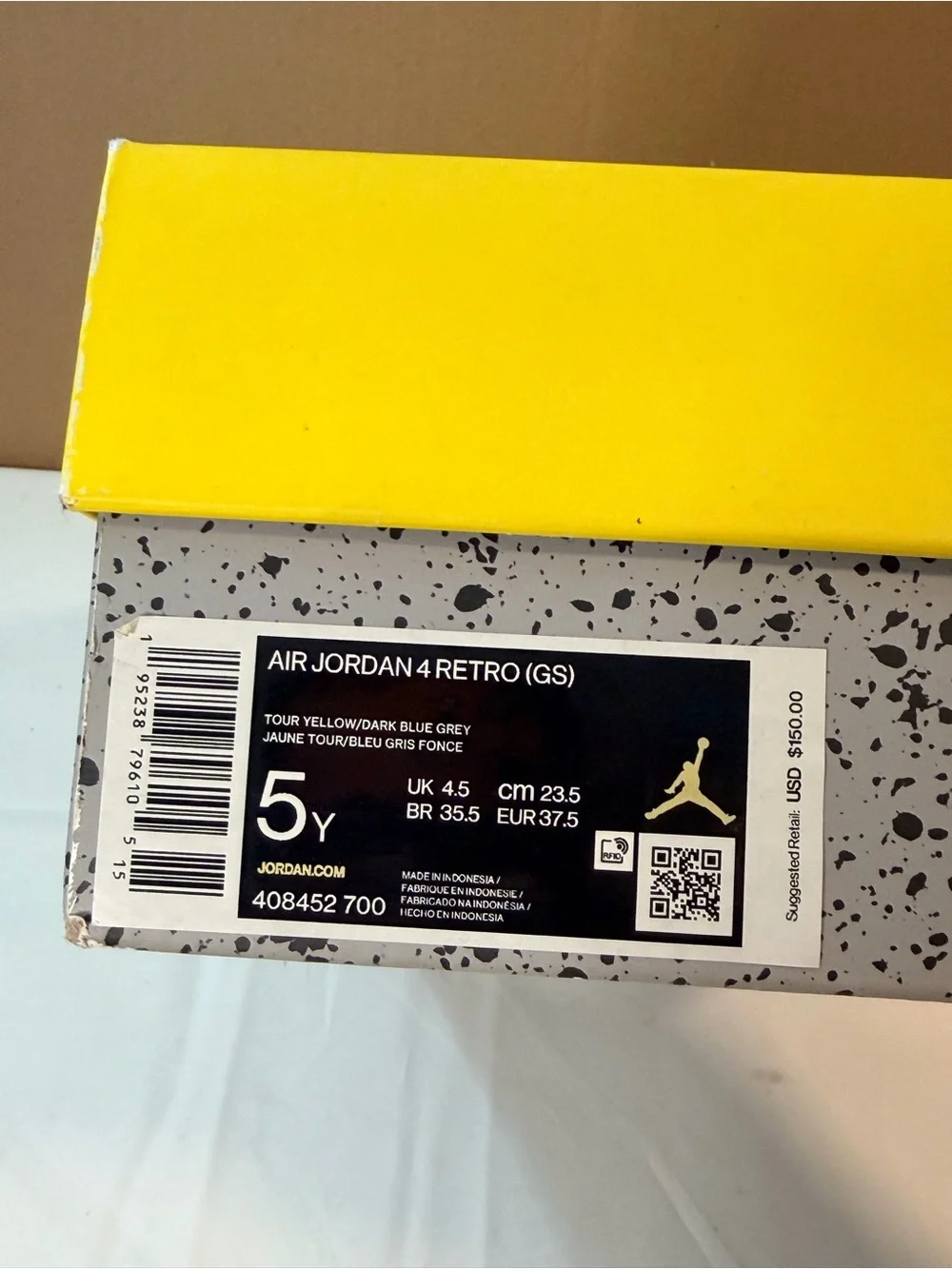 Jordan Yellow and Gray Retro 4 Sneakers